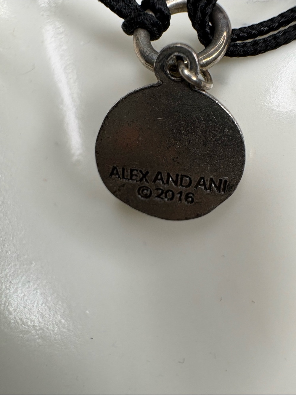 Alex and Ani Silver Coin Charm Necklace with Black Cord - Picture 3 of 4